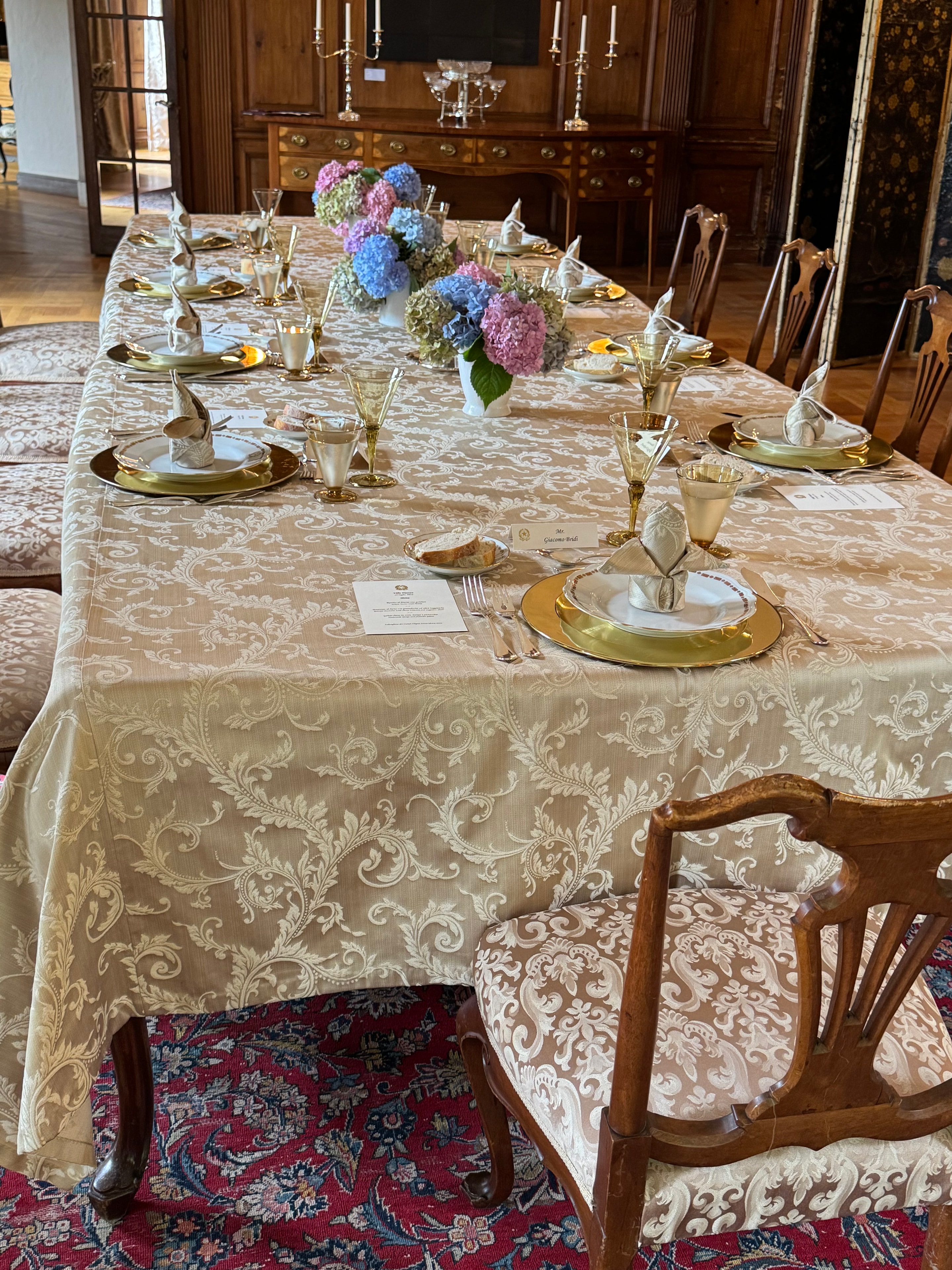 Elegant formal dining table with hydrangea centerpieces